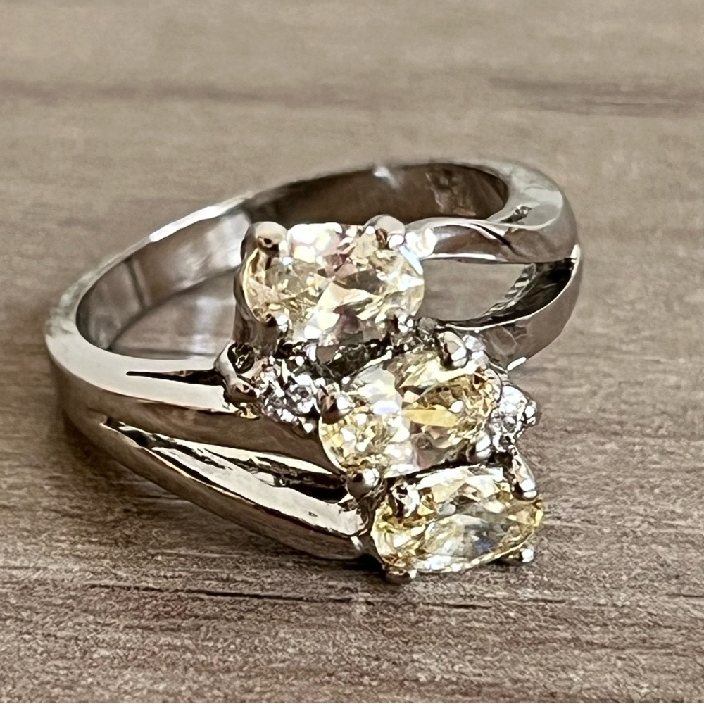 925 Sterling Silver and Oval Faceted Pale Yellow CZ's with Clear CZ Accents Ring